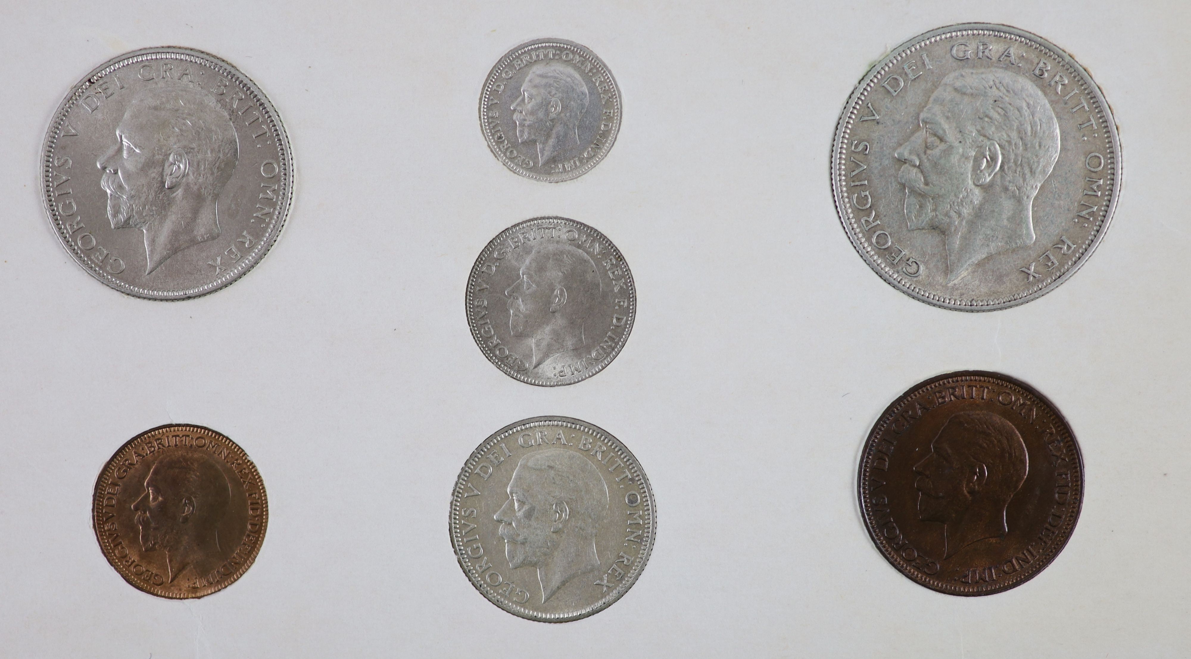 A George V specimen set of nine coins, 1933, fourth coinage, comprising Crown, (S4036), lightly toned, near EF, halfcrown, florin, sixpence and threepence, cleaned otherwise good EF/UNC, shilling, cleaned good VF/EF, pen